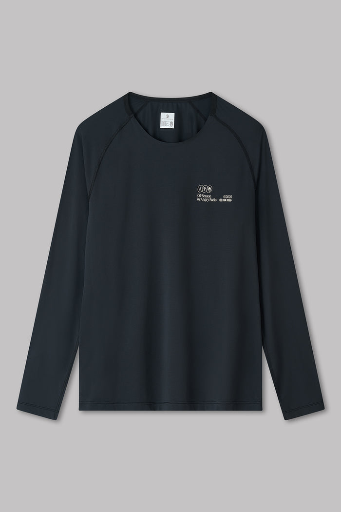 Black long-sleeve shirt with a logo on a gray background