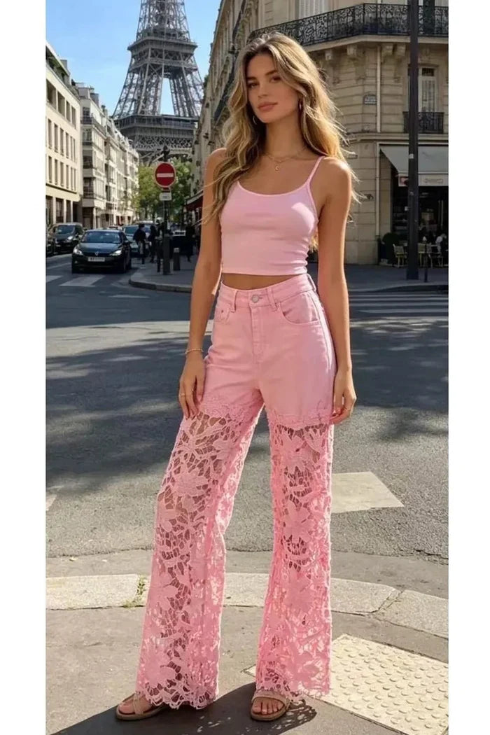 High-waisted pastel pink jeans with crochet panel detailing and a full-length relaxed leg.