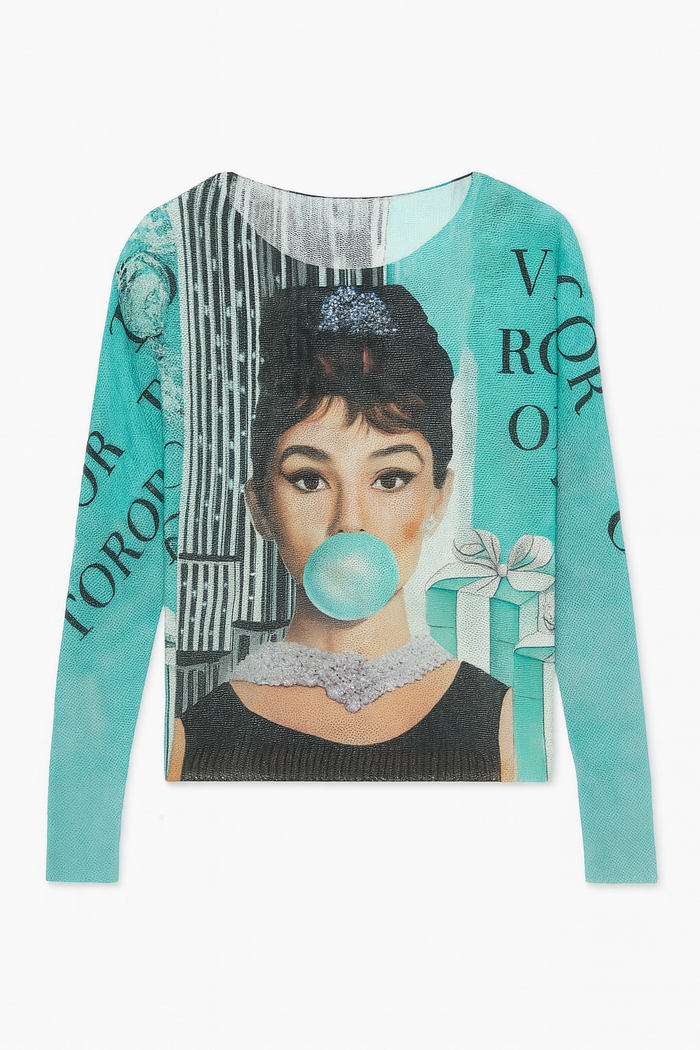 Turquoise long sleeve graphic top with an Audrey-inspired illustrated portrait and playful bubblegum detail.